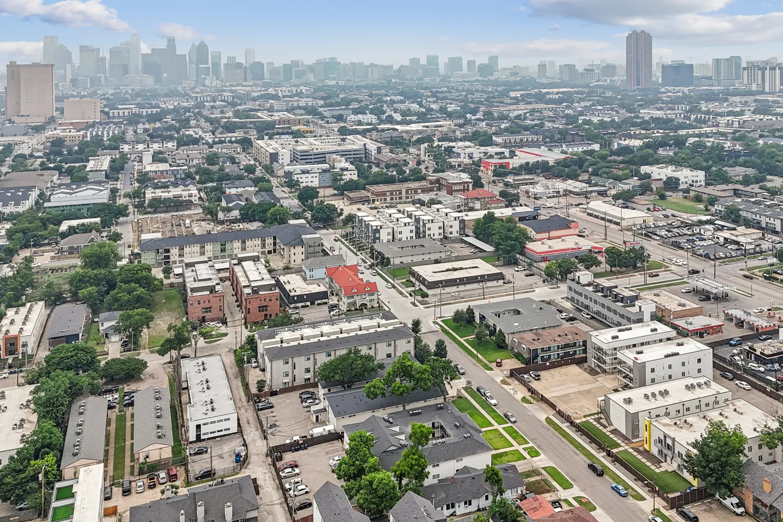 Aerial view from above The Republic toward the downtown Dallas skyline