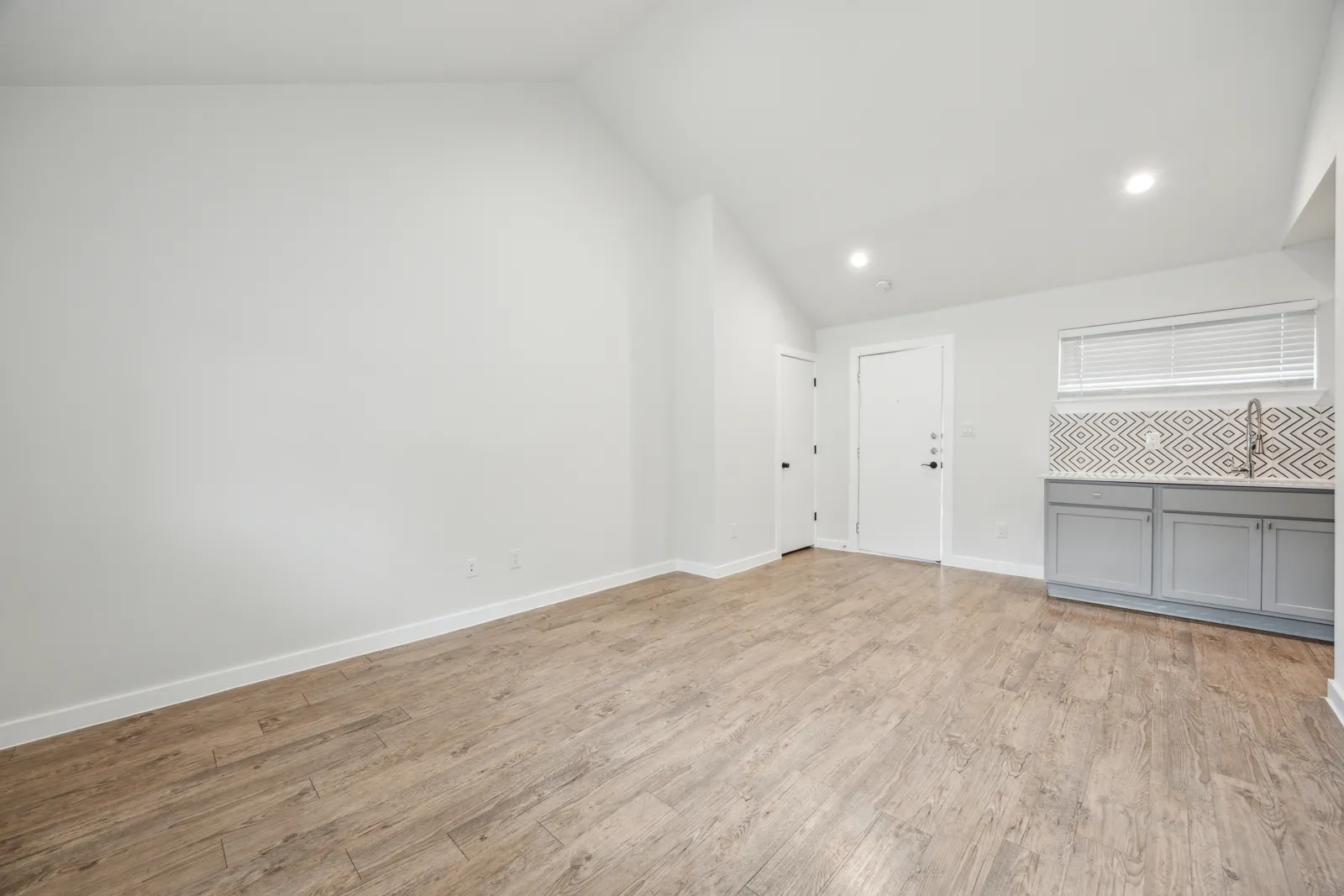 Bedroom with attached renovated bathroom and walk-in closet