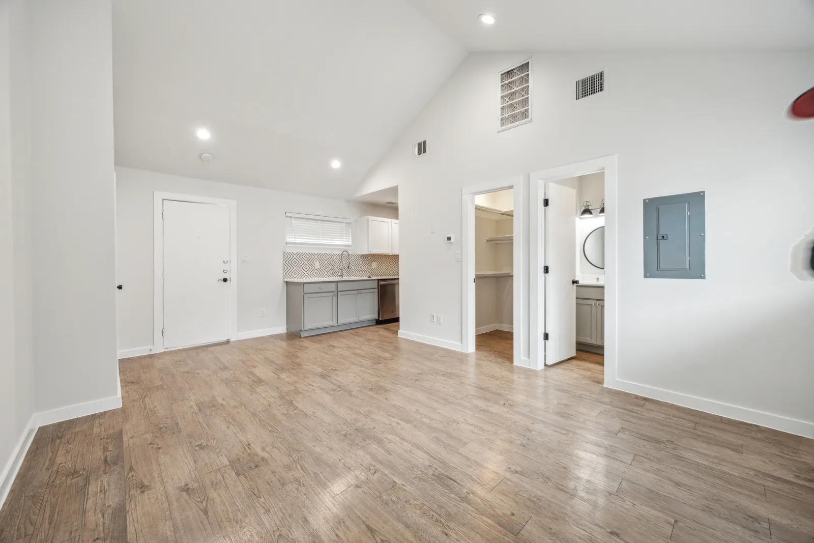 Renovated studio with vaulted ceiling and open kitchen